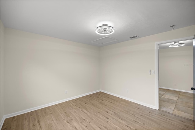 unfurnished room featuring light wood-type flooring