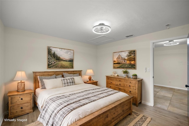 bedroom with light hardwood / wood-style floors