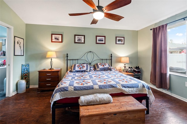 bedroom featuring ceiling fan and dark hardwood / wood-style flooring