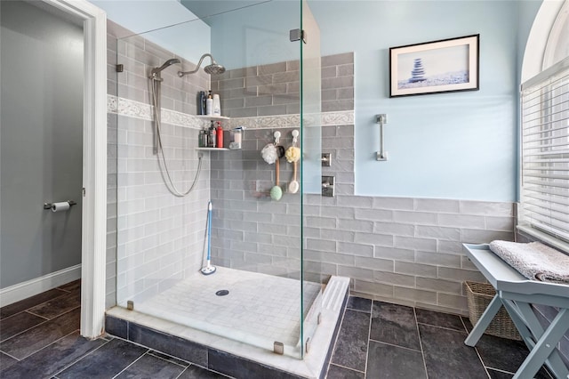 bathroom featuring tiled shower