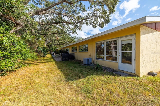 view of yard featuring central AC