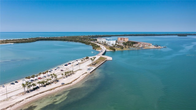 birds eye view of property with a view of the beach and a water view