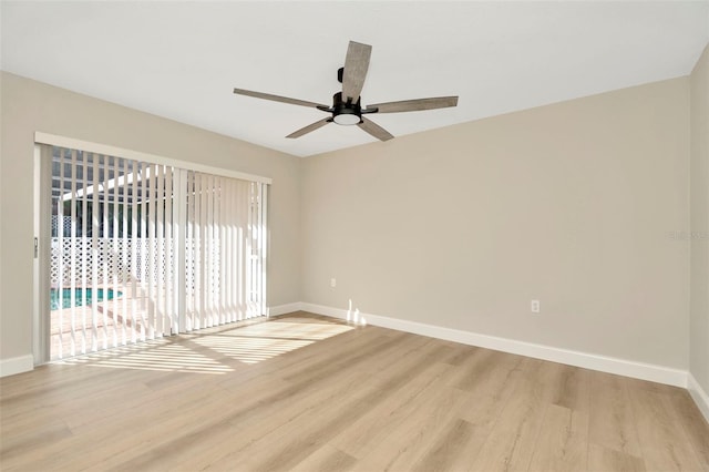 spare room featuring ceiling fan and light hardwood / wood-style floors