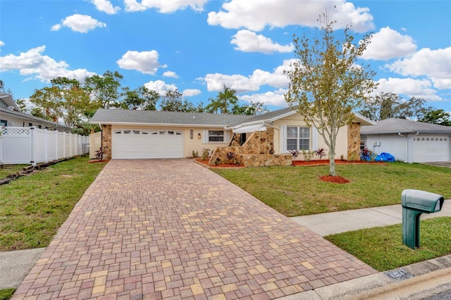 ranch-style house with a front lawn and a garage