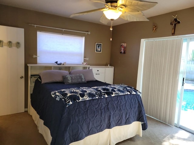 bedroom featuring access to exterior, carpet floors, and ceiling fan