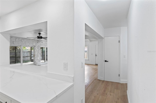 hall featuring light hardwood / wood-style flooring