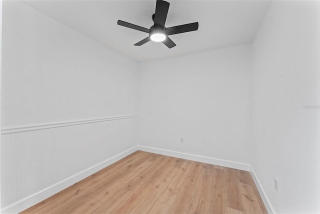 spare room featuring ceiling fan and light hardwood / wood-style flooring