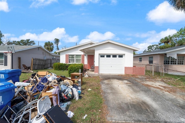 view of front of home with a garage