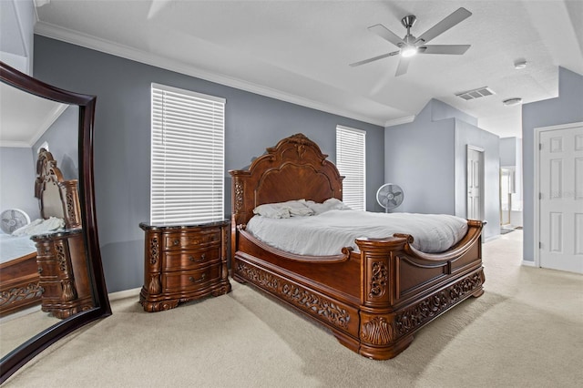 bedroom featuring ceiling fan, carpet floors, and ornamental molding