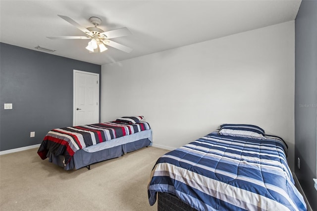 bedroom featuring ceiling fan and carpet floors