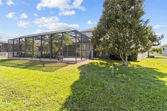 view of yard with a patio area and a lanai