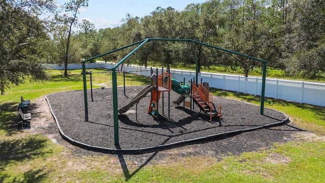 view of playground featuring a yard