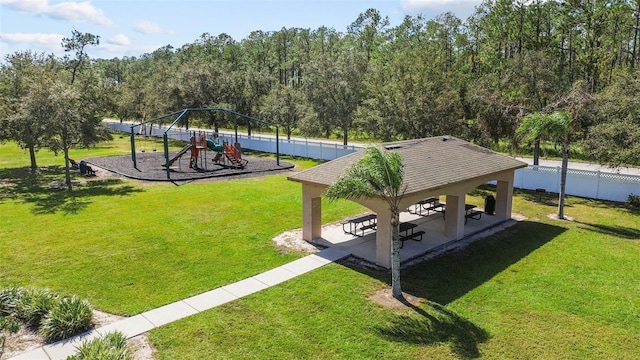 view of property's community with a playground, a yard, and a gazebo