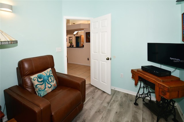 sitting room featuring light wood-type flooring