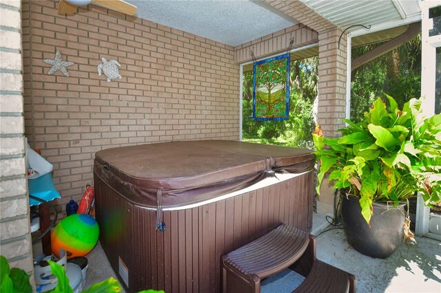 view of patio featuring a hot tub