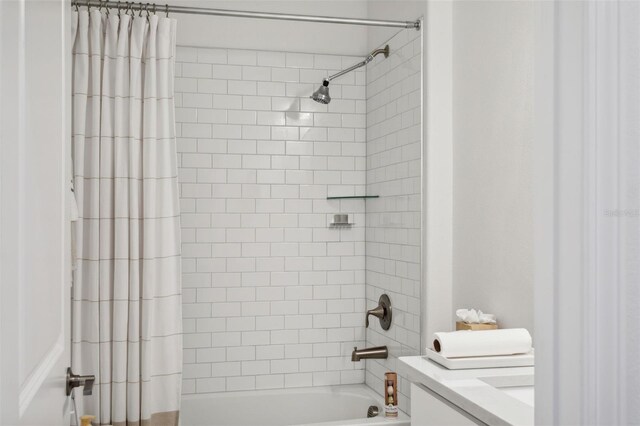 full bathroom featuring vanity, toilet, and shower / bathtub combination with curtain