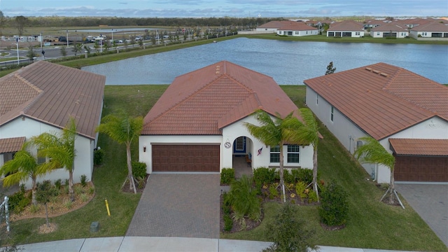 drone / aerial view with a water view