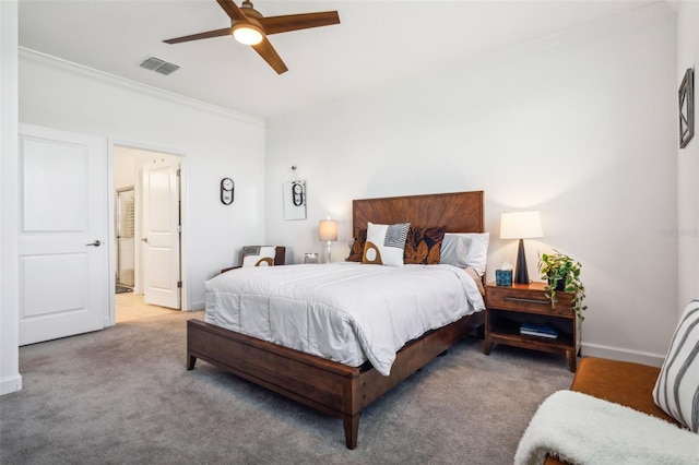 carpeted bedroom featuring ceiling fan and ornamental molding