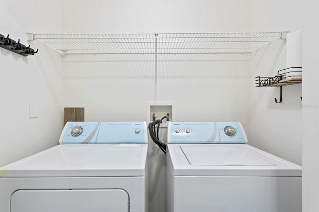 laundry area with washer and clothes dryer