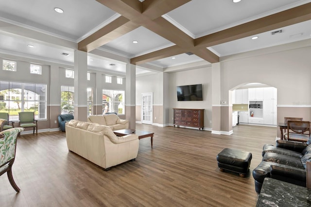 living room featuring hardwood / wood-style flooring, beamed ceiling, crown molding, and coffered ceiling