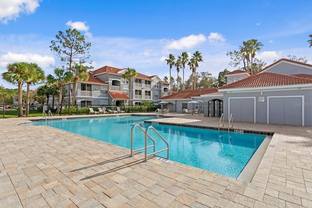 view of pool featuring a patio