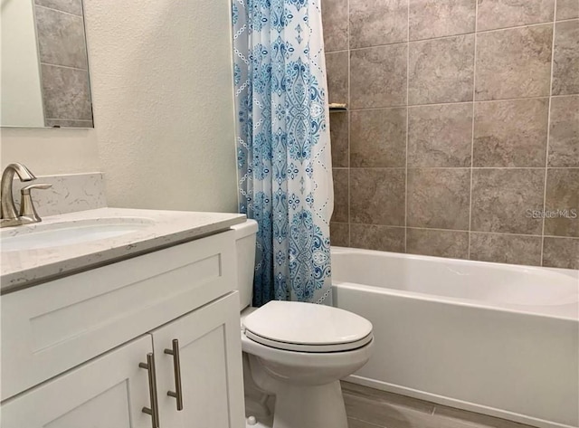 full bathroom featuring toilet, vanity, shower / bath combo, and hardwood / wood-style flooring