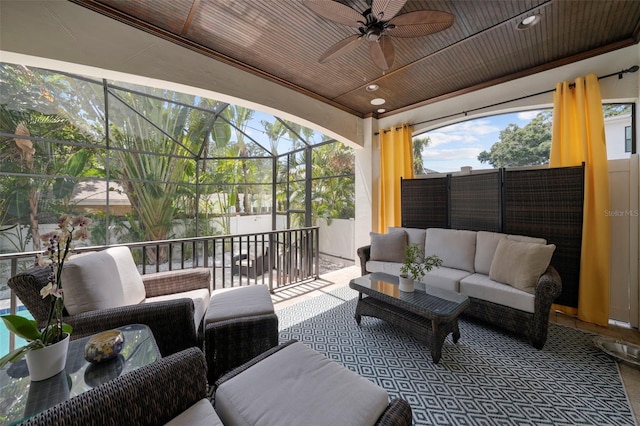 view of patio featuring outdoor lounge area, ceiling fan, and a balcony