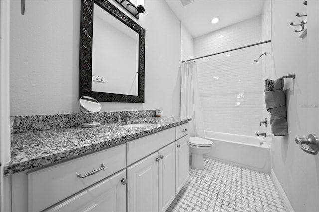 full bathroom featuring shower / tub combo with curtain, vanity, and toilet