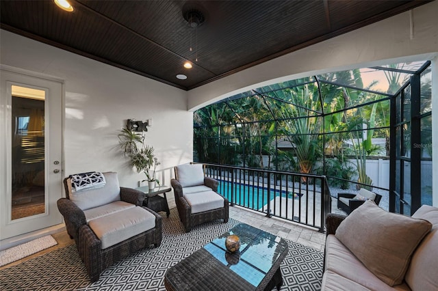 view of patio featuring outdoor lounge area and a balcony