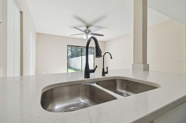 interior details with light stone counters and sink