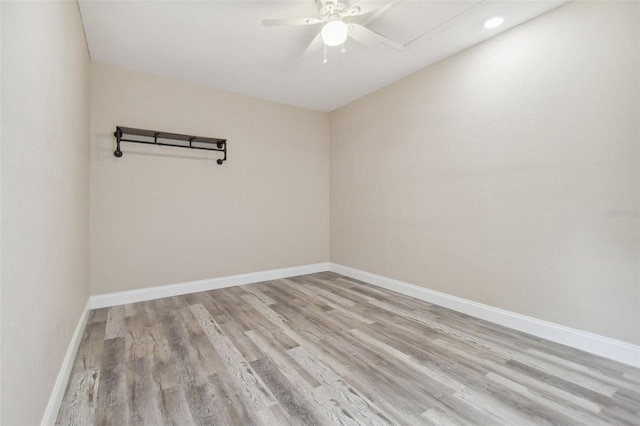 unfurnished room featuring light hardwood / wood-style flooring and ceiling fan