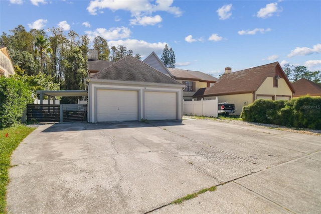 view of side of home featuring a garage