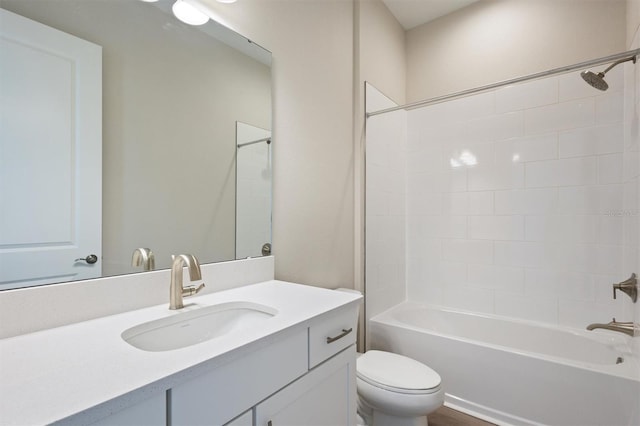 full bathroom featuring toilet, vanity, and shower / bathtub combination