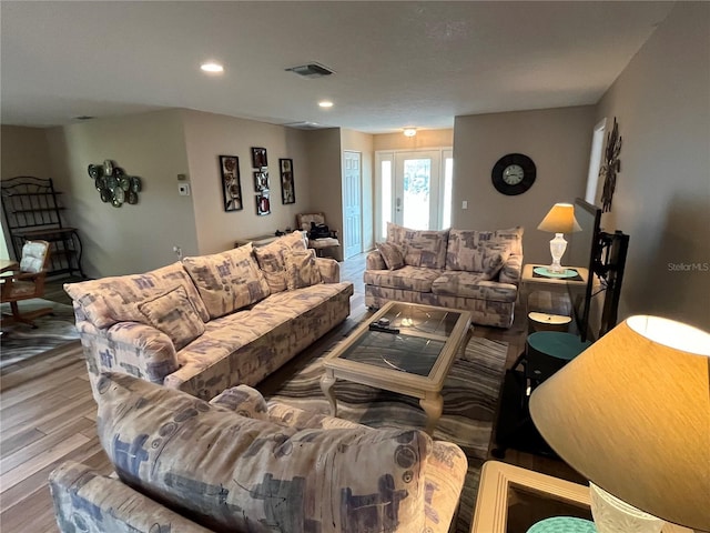 living room with hardwood / wood-style flooring