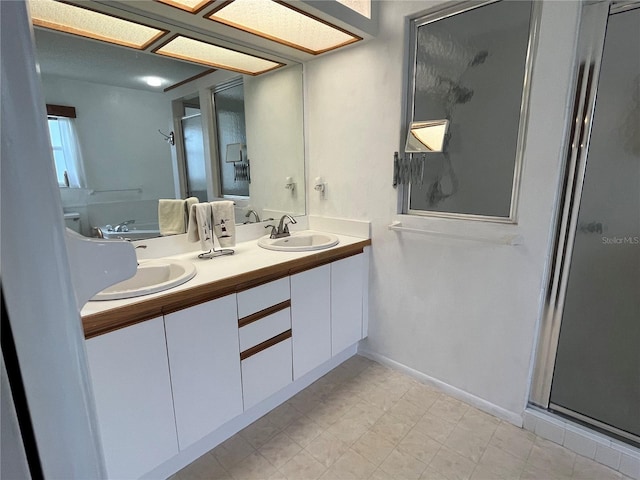 bathroom with vanity and an enclosed shower