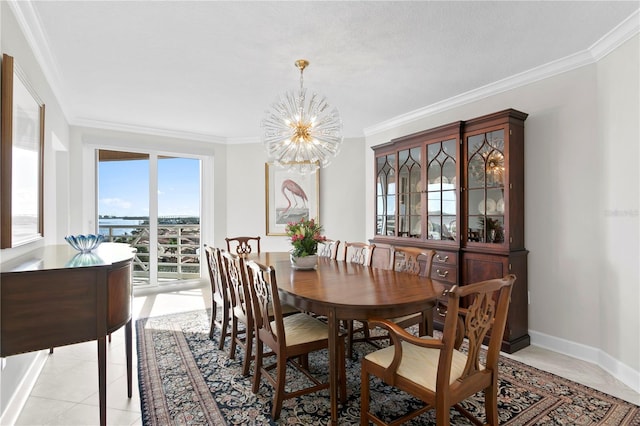 dining area featuring light tile patterned flooring, ornamental molding, and a notable chandelier