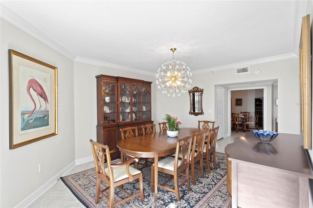 dining room with a chandelier and ornamental molding