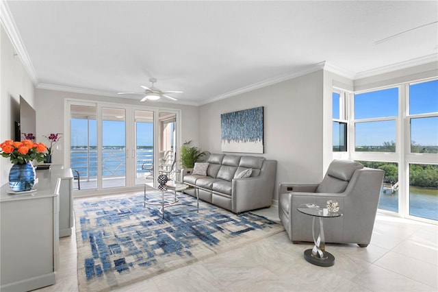 living room with ceiling fan, plenty of natural light, and crown molding