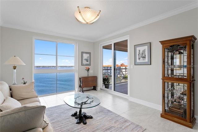 living room featuring light tile patterned flooring, a water view, and ornamental molding