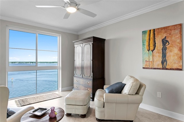 sitting room featuring light tile patterned flooring, ceiling fan, a water view, and crown molding