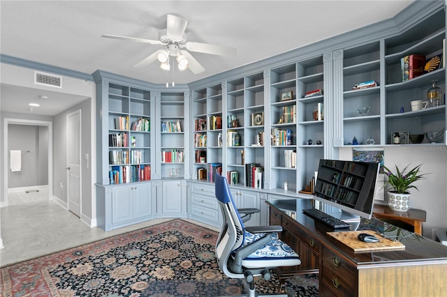 office area with a textured ceiling, ceiling fan, and crown molding