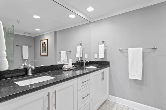 bathroom with vanity and crown molding