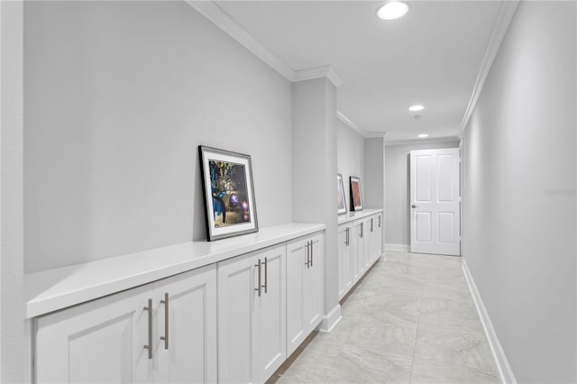 hallway featuring ornamental molding