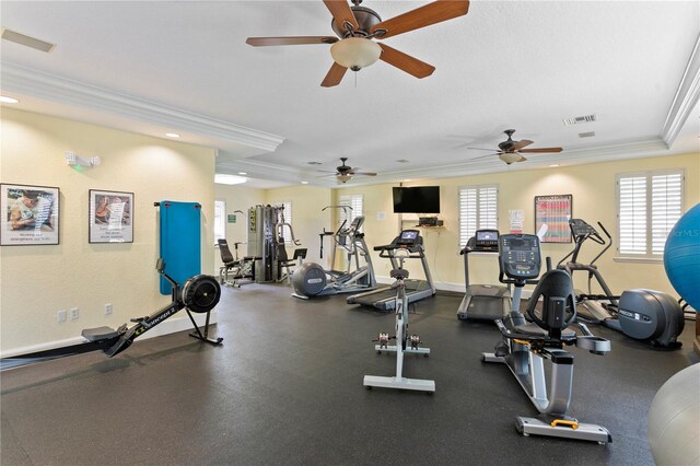 gym with ornamental molding