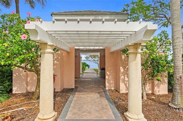 property entrance featuring a carport