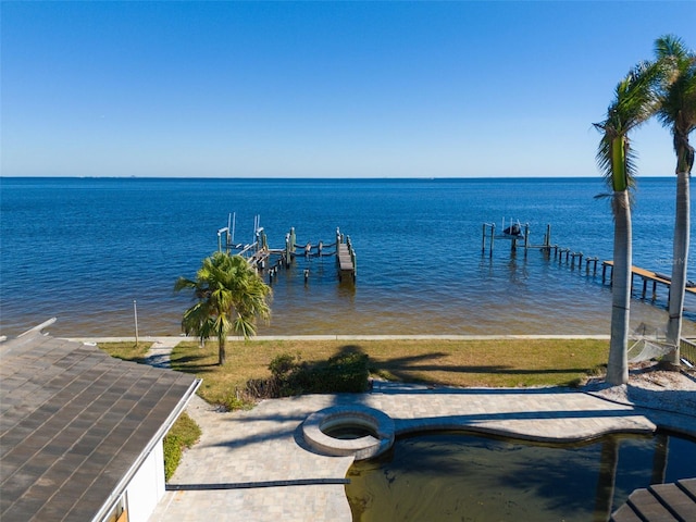 dock area featuring a water view