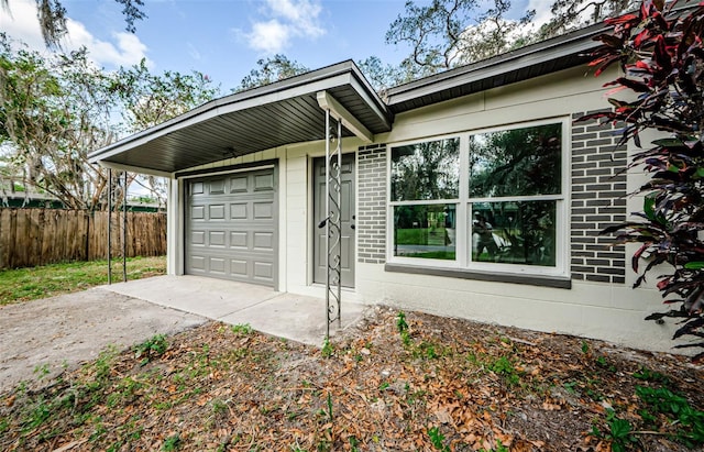 exterior space with a garage