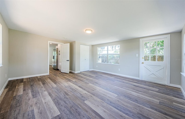 interior space with hardwood / wood-style flooring