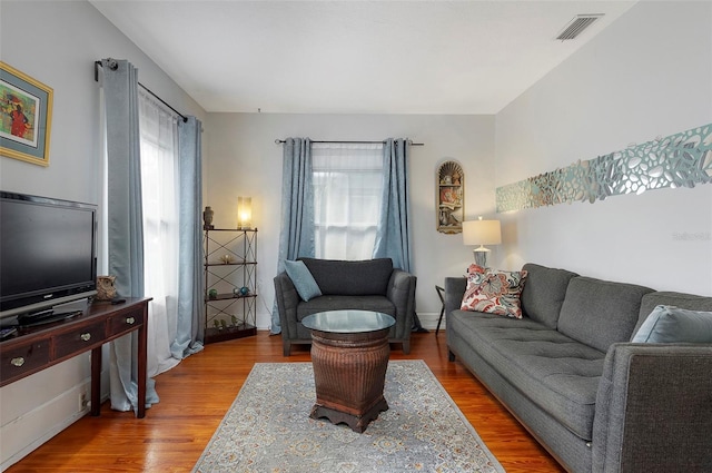 living room with hardwood / wood-style floors