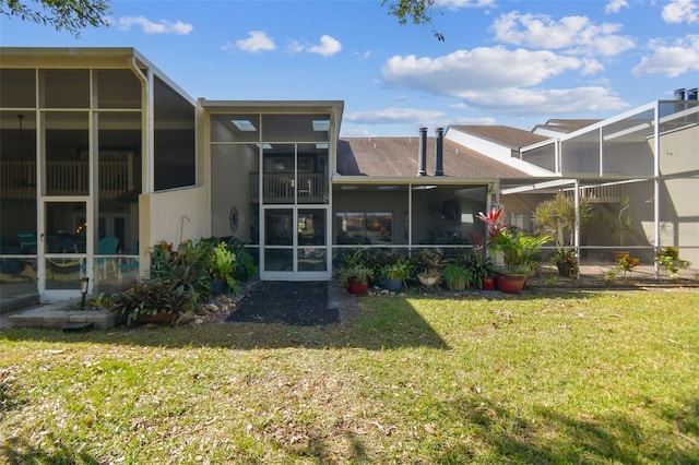 back of house with a yard